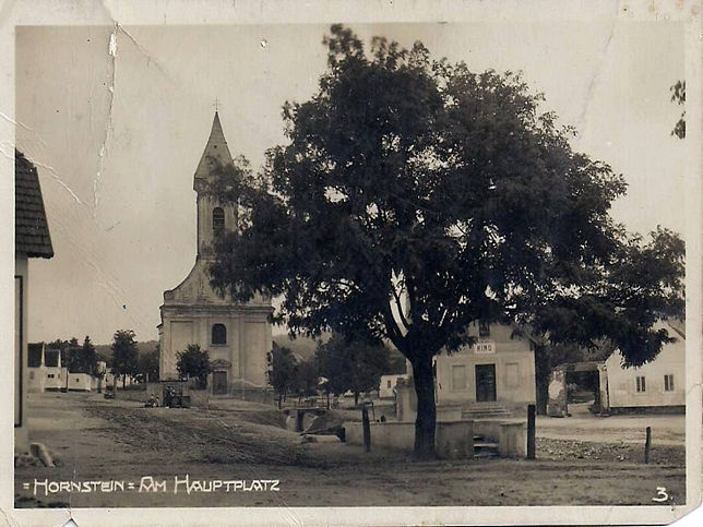 Hornstein, Hauptplatz mit Kino und Kirche