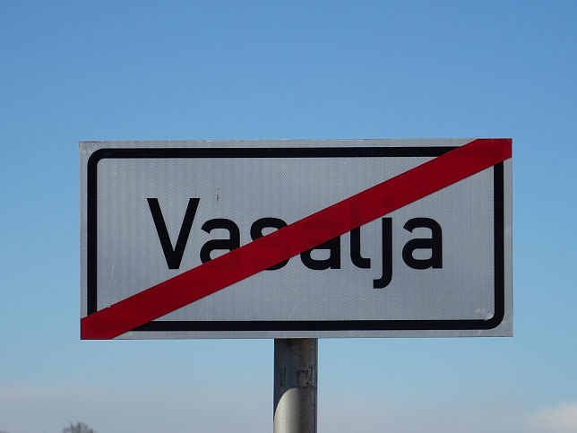 Vasalja, Ortstafel-Ende