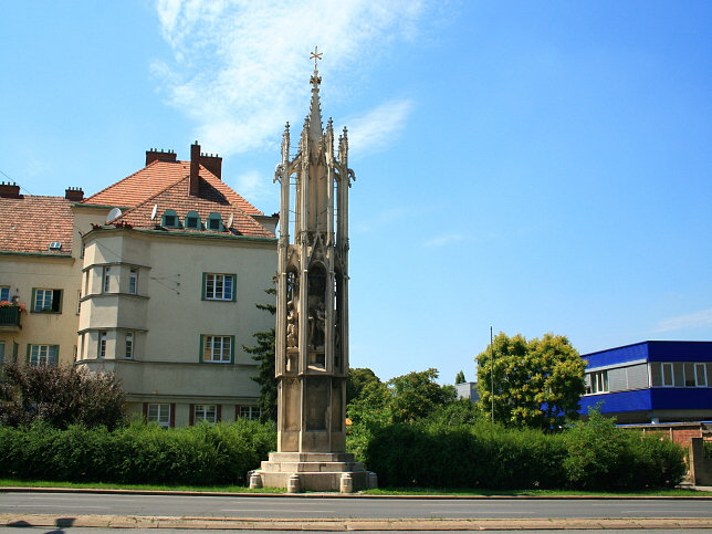 Spinnerin am Kreuz